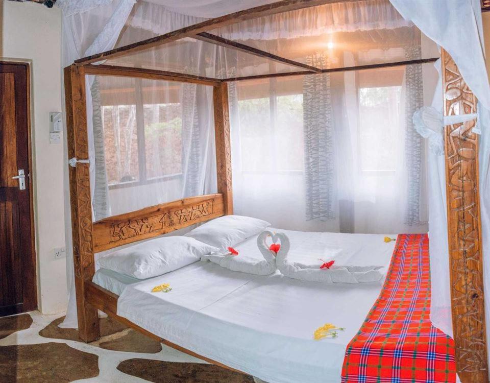 Kijani Cottages Dianiディアニ・ビーチ エクステリア 写真