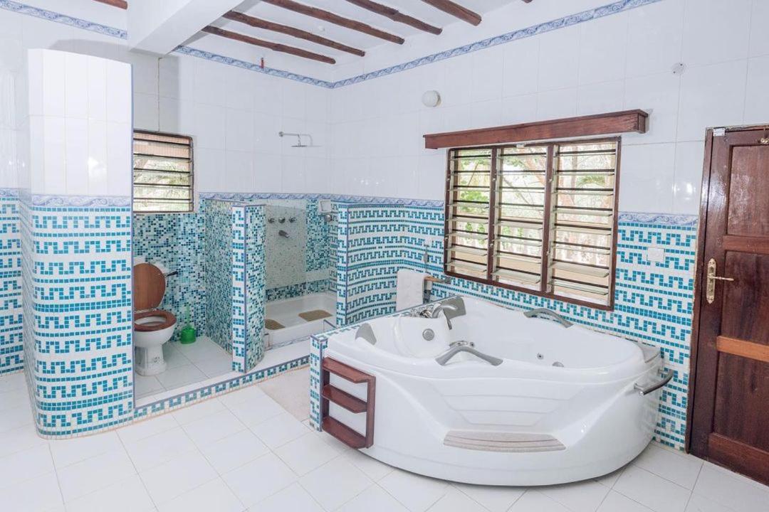 Kijani Cottages Dianiディアニ・ビーチ エクステリア 写真